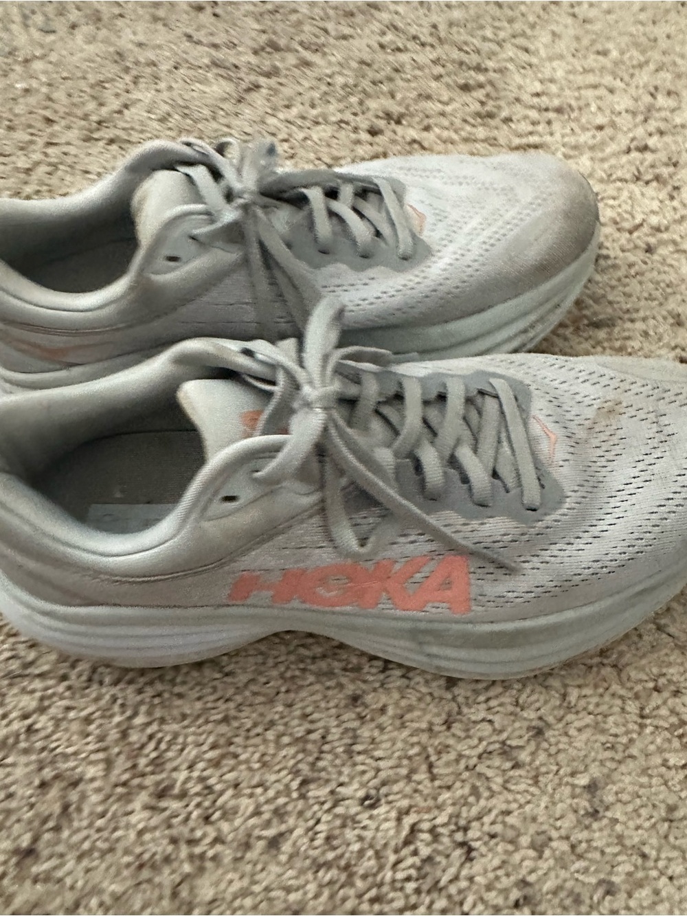 Hoka Light Gray Sneakers with Pink Logo Accent